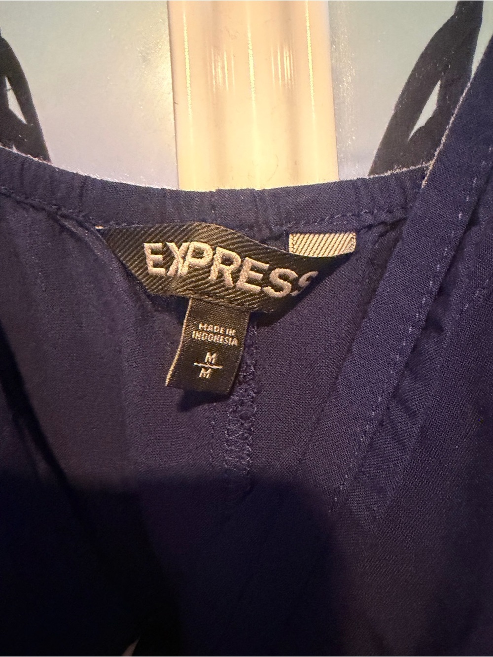 Express rompers and dresses featuring spaghetti straps, ruffles, & floral prints - Picture 7 of 13